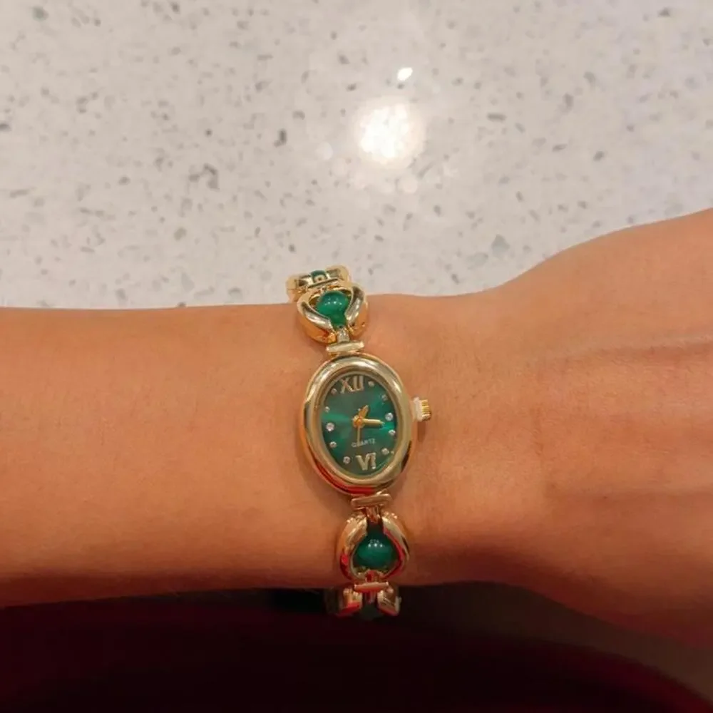 Gold and green vintage watch